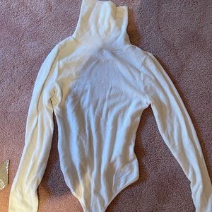 Cream body suit. Very soft!
